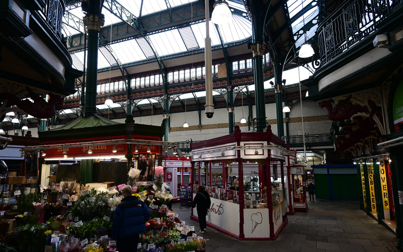 Traders and the glass roof inside Leeds Kirkgate Market